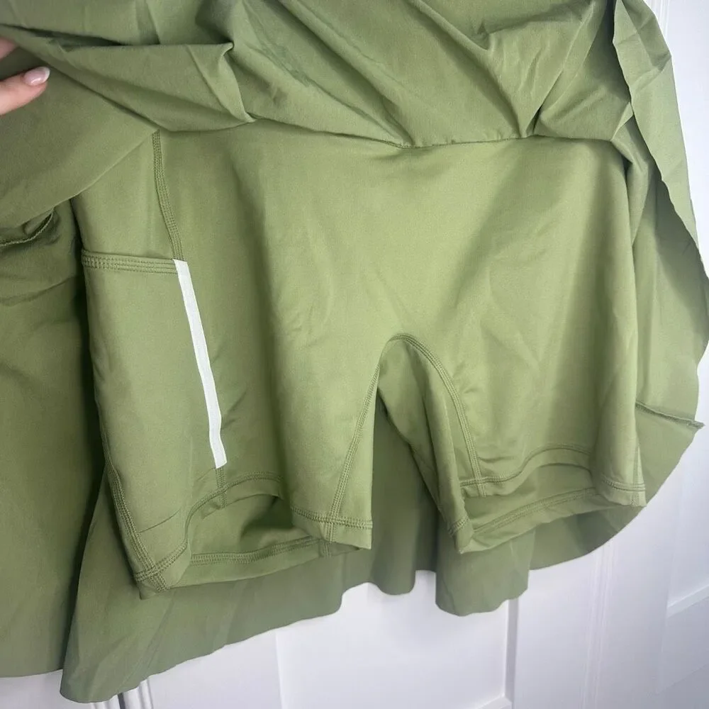 NWT Nike olive Green Tennis Skirt with Shorts Under that have Pockets. Size XL (